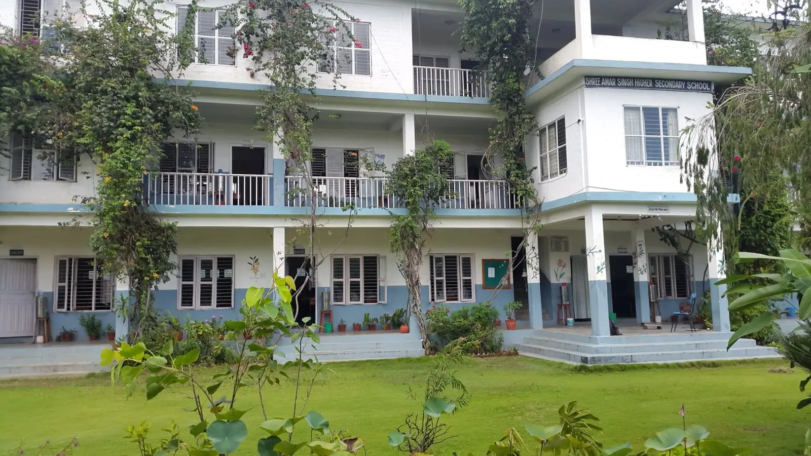 Classroom block surrounded by greenery