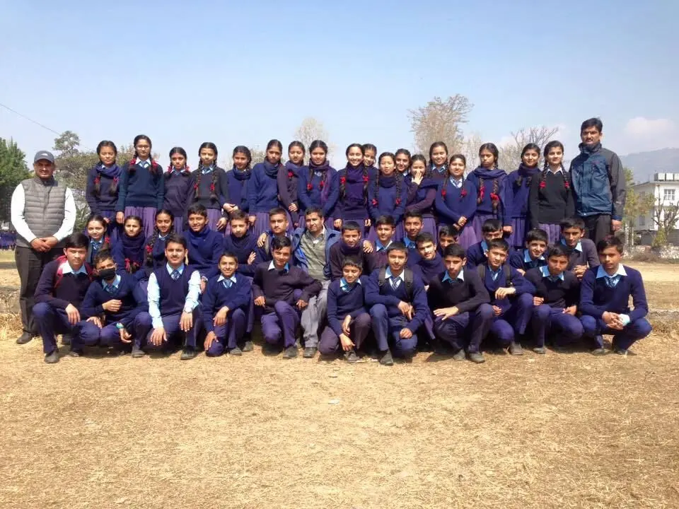 Students group photo on the field